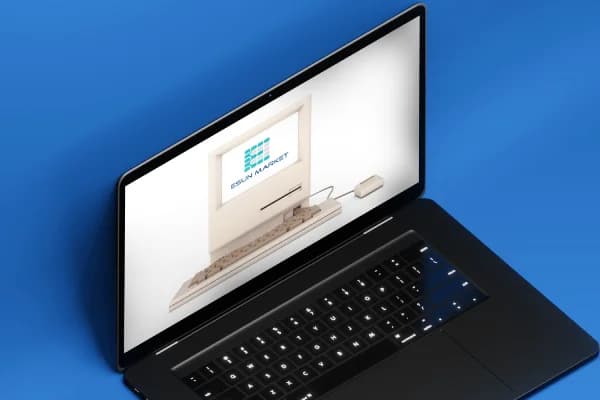 MacBook with Esun Market logo